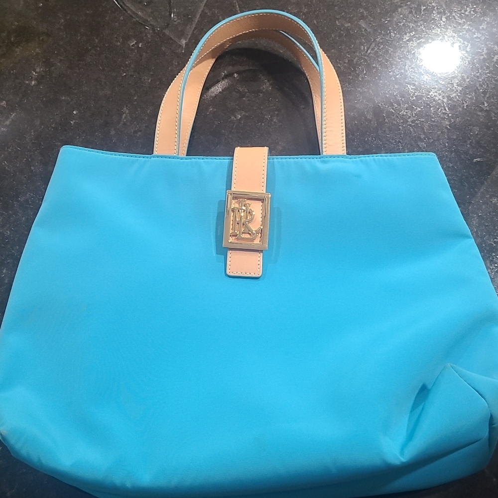 Turquoise and tan Lauren Ralph Lauren purse.
